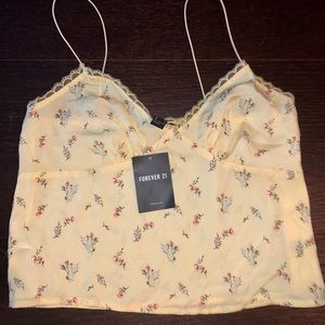 Forever 21 yellow floral tank. Never been worn.